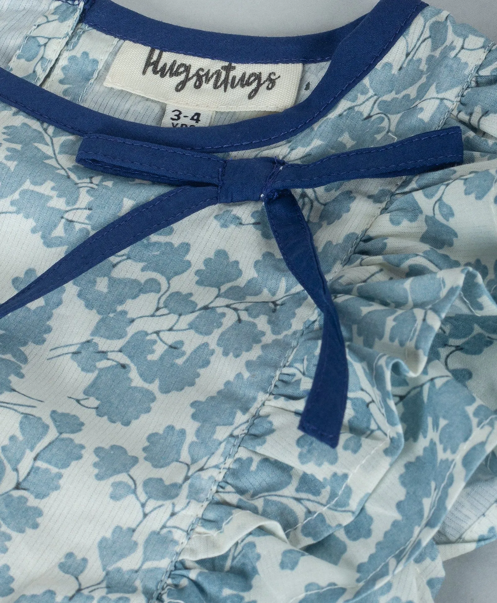 Floral top with contrast navy neck binding-Soft Blue